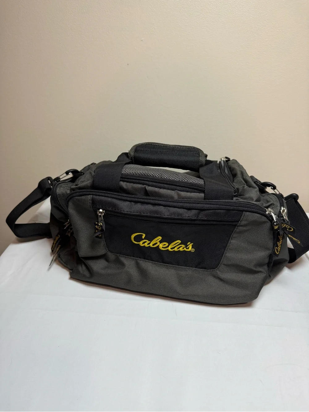 Cabela's Olive Green and Black Duffel Bag with Yellow Logo